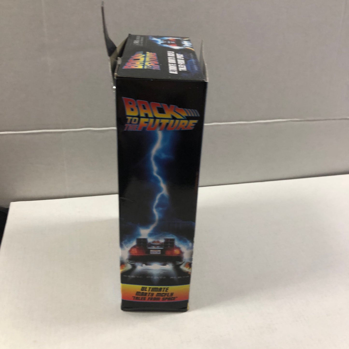 NECA BACK TO THE FUTURE ULTIMATE MARTY MCFLY TALES FROM SPACE OKAY CONDITION TEAR ON BACK OF BOX