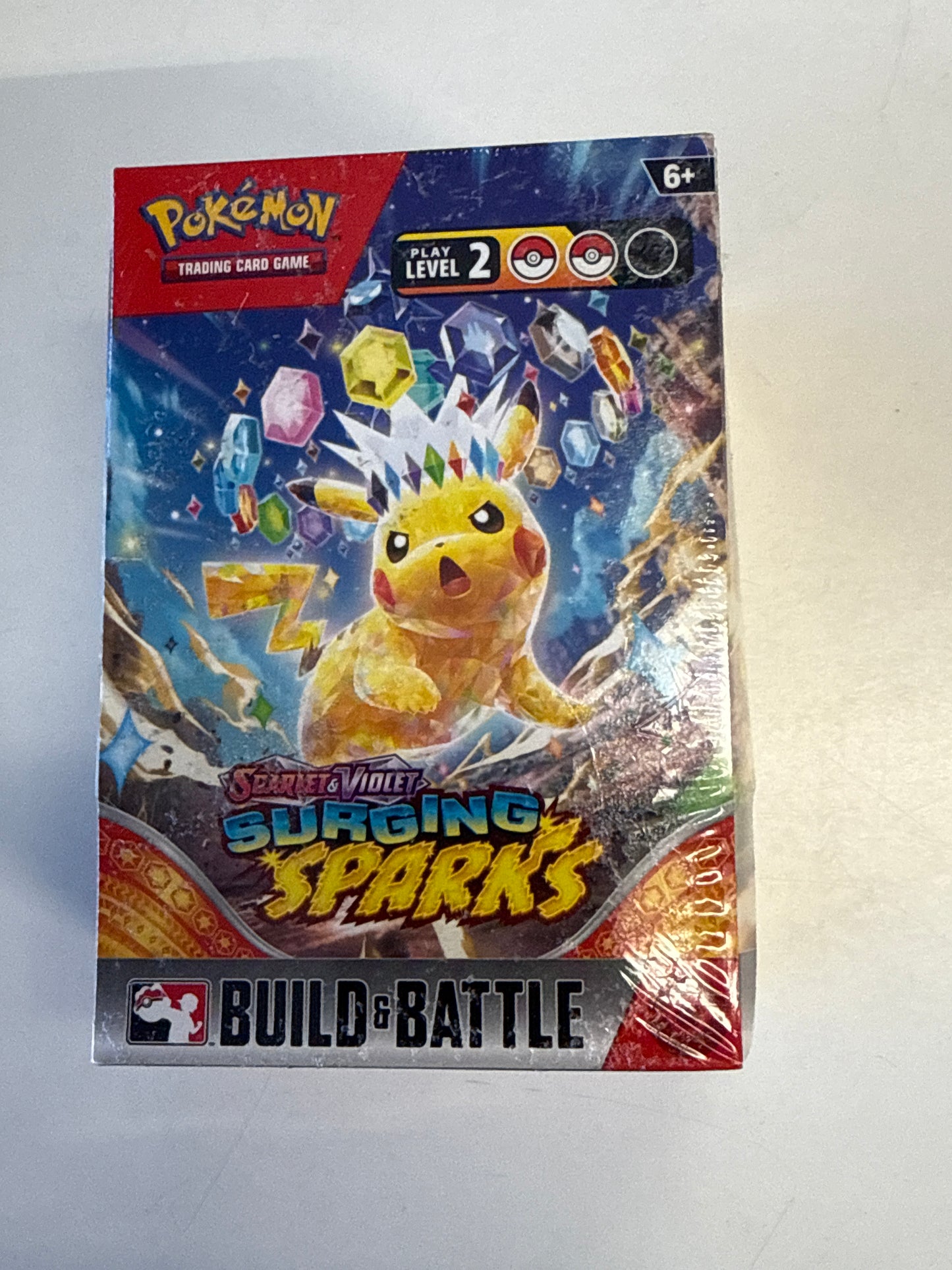 POKEMON TCG SCARLET & VIOLET SURGING SPARKS BOOSTER BUILD & BATTLE BOX SEALED