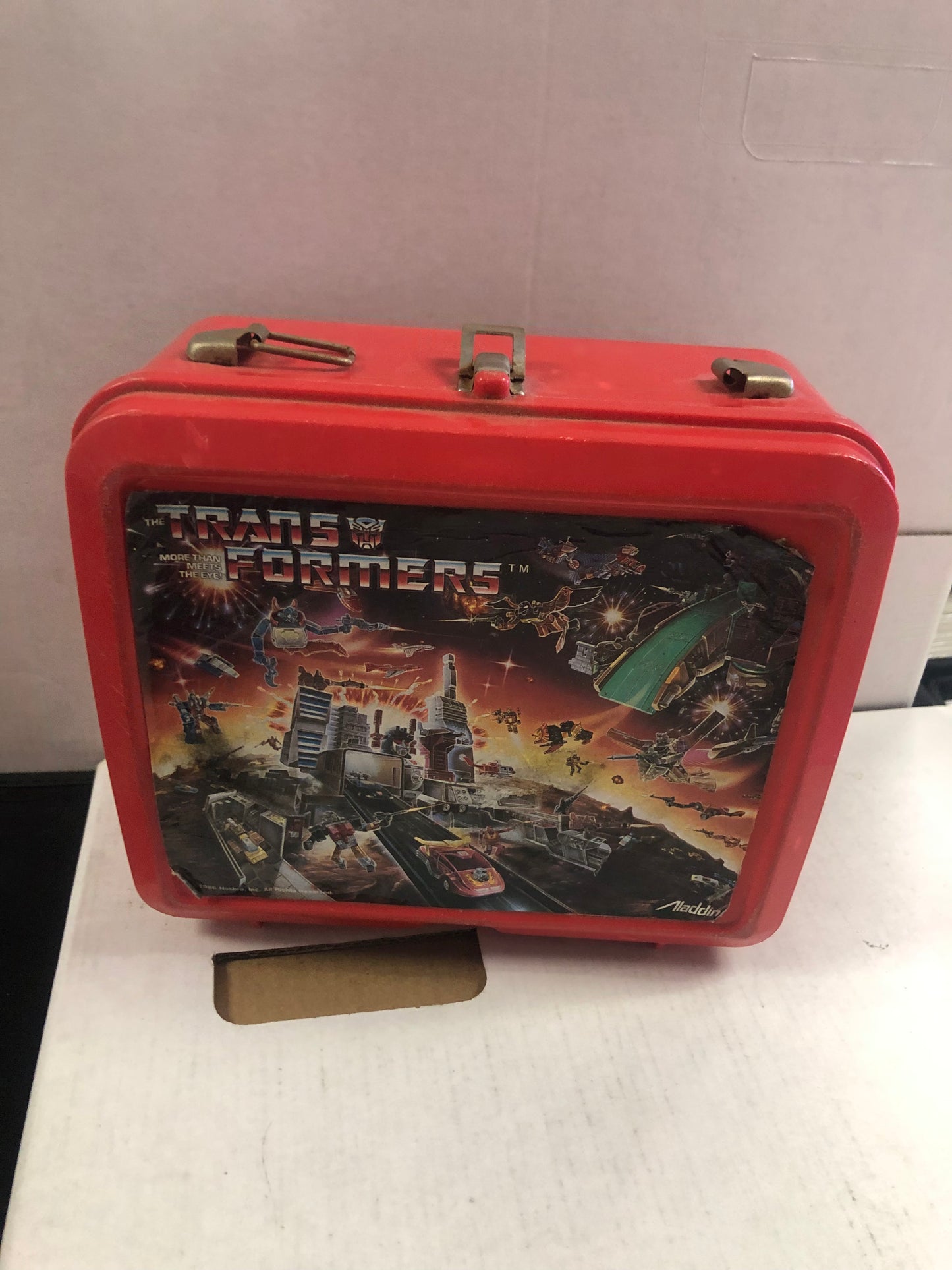 ALADDIN 1986 TRANSFORMERS MORE THEN MEETS THE EYE LUNCHBOX NO THERMOS SLIGHT WEAR ON FRONT OF LUNCHBOX