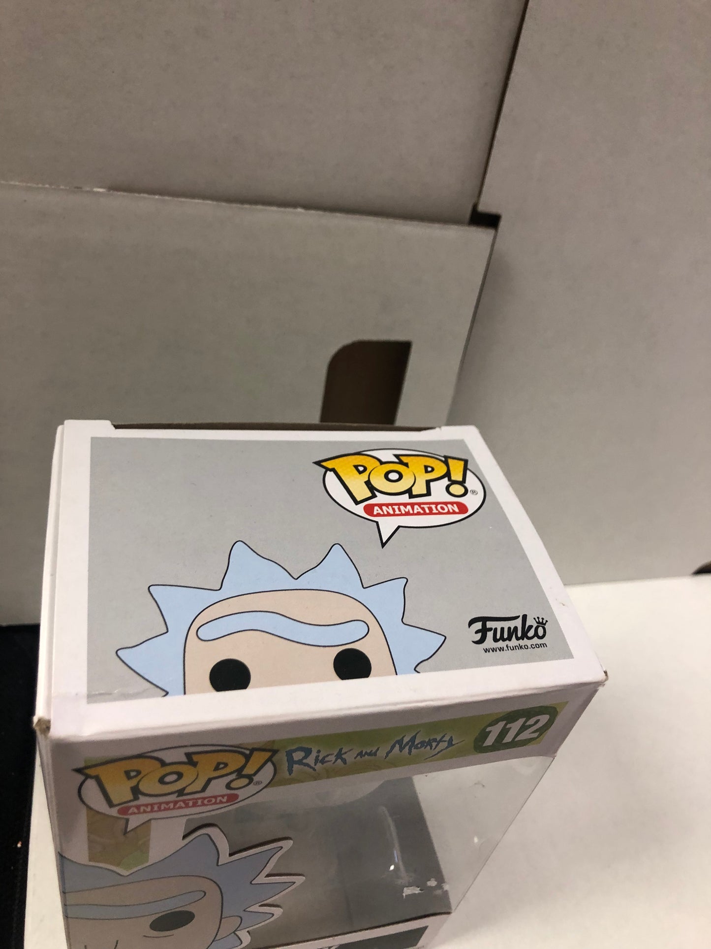 FUNKO POP POP ANIMATION RICK AND MORTY #112 RICK OKAY CONDITION PLASTIC LOOSE ON FRONT OF BOX