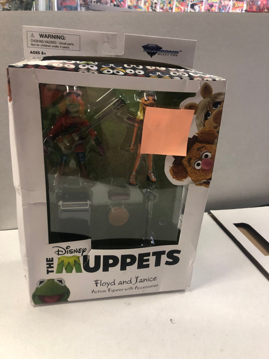 DIAMOND SELECT THE MUPPETS FLOYD AND JANICE ACTION FIGURES AND ACCESSORIES POOR CONDITION PLASTIC LOOSE ON FRONT OF BOX AND MULTIPLE TEARS ON BOX