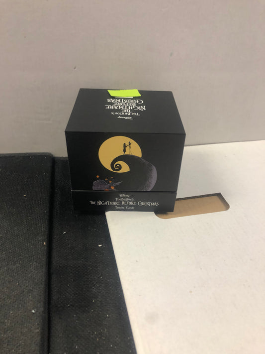 NIGHTMARE BEFORE CHRISTMAS SCENTED CANDLE (c)